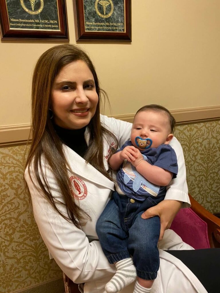 Doctor Carrying Baby