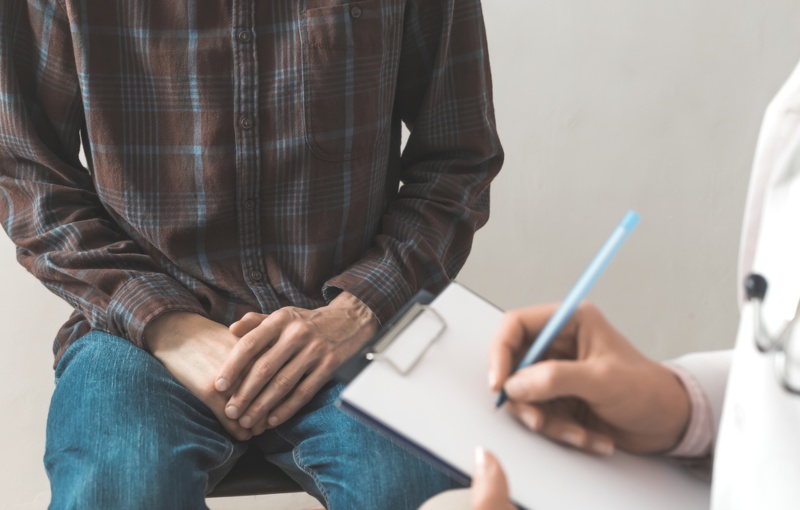 doctor working with patient