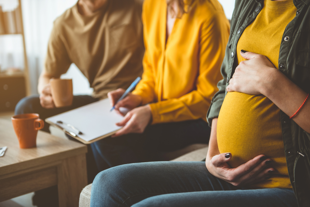 Intended parents with surrogate on surrogacy journey
